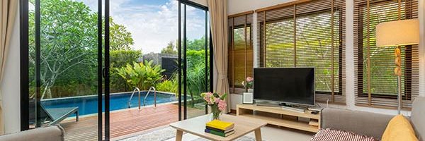 stunning-pool-view-from-a-living-room-in-luxury-villa_t20_2wZK4P.jpg